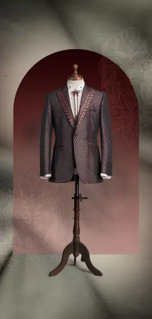 Elegant bohemian suit with diamond patterns and red detailing.
