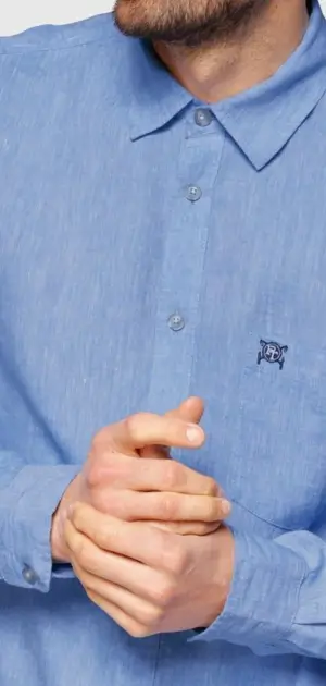Light blue classic formal dress shirts for men showcasing a simple and elegant design.