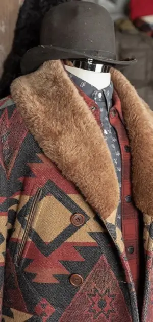 Vintage men’s jacket featuring rich earthy tones, tribal patterns, and a cozy fur-lined collar.