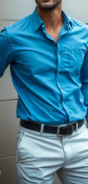Street wear outfits male Men’s bright blue streetwear formal dress shirt styled with white trousers.