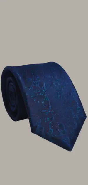 Men wearing linen ties in dusty blue and light gray at a wedding