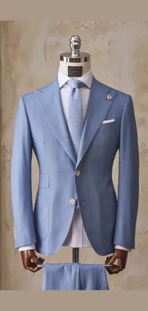 Cotton formal shirts for men sky blue Light blue single-breasted cotton formal suit displayed on a mannequin.