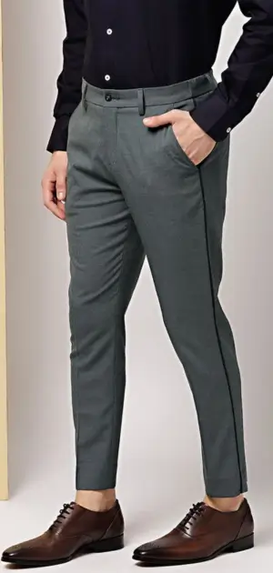 Slim-fit green office pants men styled with a black shirt and brown shoes.