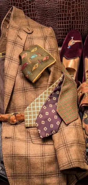 Men’s vintage suit accessories featuring ties, pocket squares, and shoes.