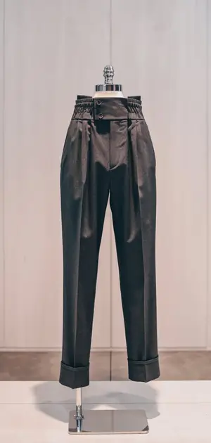 Black leather pants on display