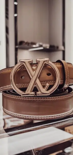 Nylon and leather belt with a stitched design