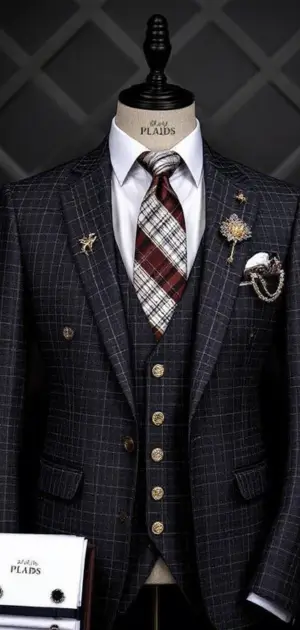 Navy plaid suit with red plaid tie and gold button details