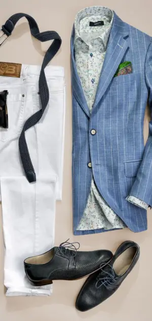 Men’s outfit Athletic featuring a tailored blazer, floral shirt, white pants, suspenders, and leather shoes.