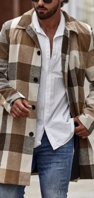 Men’s checkered streetwear coat with a relaxed fit, paired with a white shirt and jeans.
