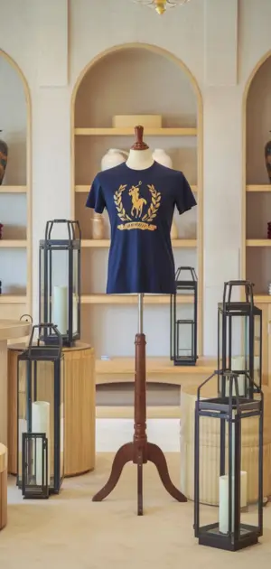 Navy blue Ralph Lauren t-shirt with gold logo on display