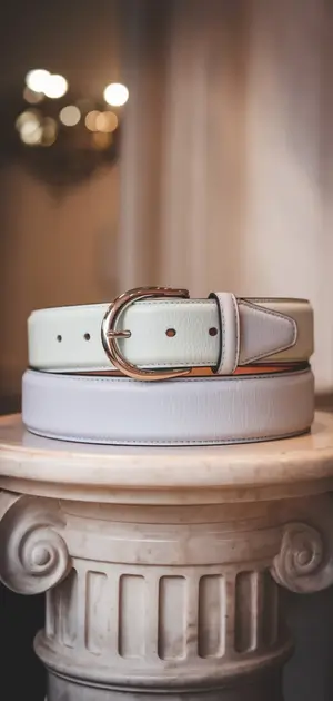 White and grey spring belt for men on column