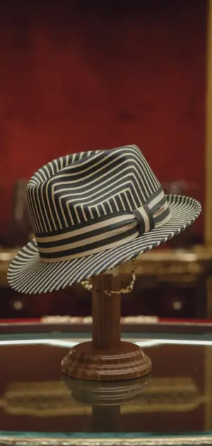 Black and white striped hat with a stylish band