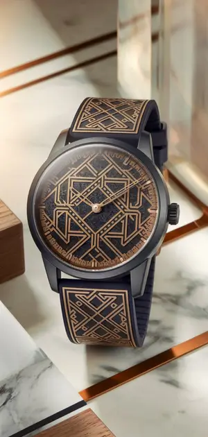 Transparent geometric design watch with gold accents on the dial.