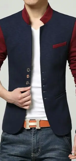 Men’s navy sports blazer with maroon sleeves and accents, paired with jeans.