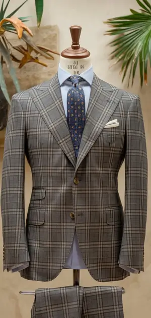 Mannequin displays grey checked double-breasted suit
