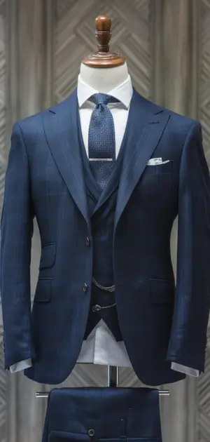 Display of cotton three-piece suits for men