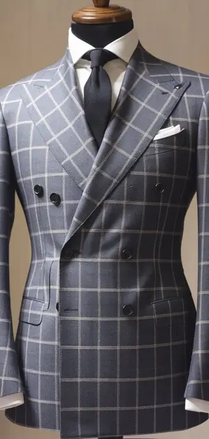 Light grey plaid double-breasted suit on a mannequin