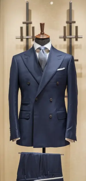 Navy double-breasted suit on a mannequin in a store