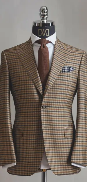 Brown and blue checked modern suit on display