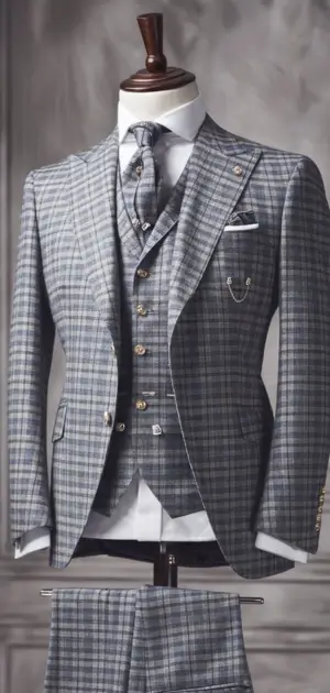 Grey and white glen check three-piece suit on mannequin