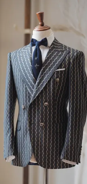 Blue herringbone double-breasted suit on display