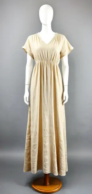 Beige maxi dress displayed on a mannequin