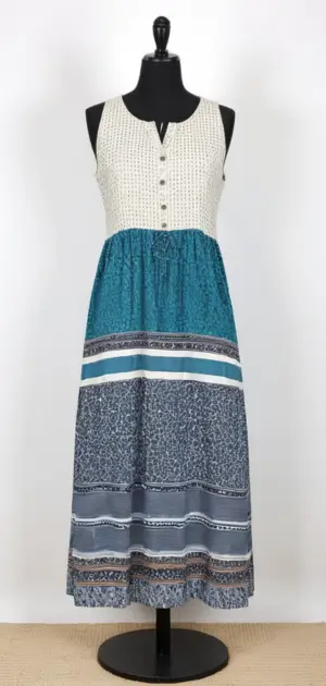 Blue sleeveless maxi dress with pockets and a waist tie on a mannequin