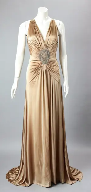Golden silk maxi dress with ornate embellishment