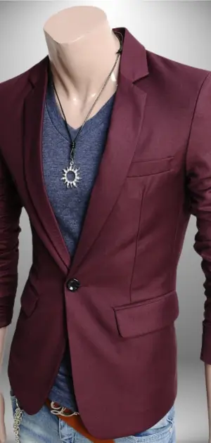 Men’s maroon sports blazer styled with a blue t-shirt and bold accessories.