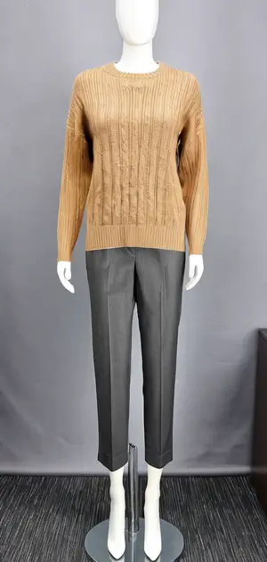Brown sweater with beige trousers on mannequin