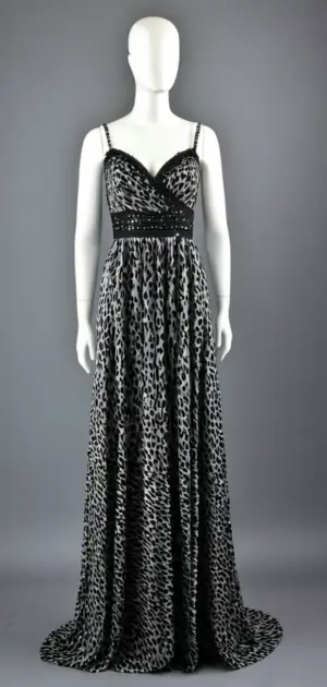 Glamorous black and silver sequined maxi dress on mannequin