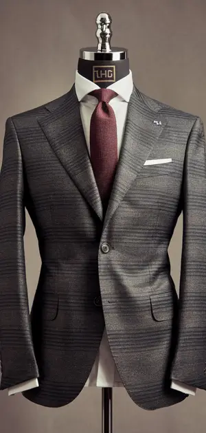 Dark gray modern fit suit on mannequin