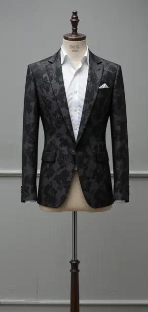 Black floral-patterned blazer styled with a white shirt for sophistication.