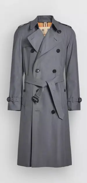 Grey trench coat with epaulettes, belt, and double-breasted buttons.