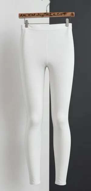 High-waisted white leggings with a simple, stretchy design.