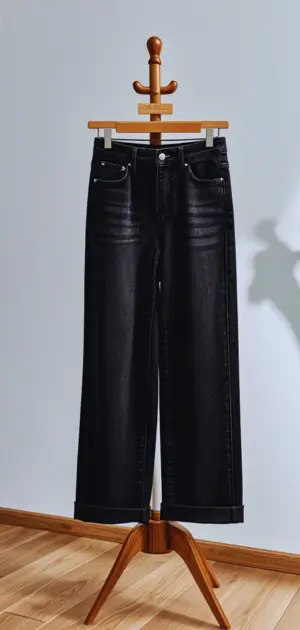 Wide-leg black jeans paired with crop top