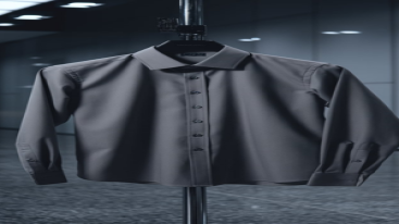 Beige formal shirt displayed on a mannequin in a clothing store