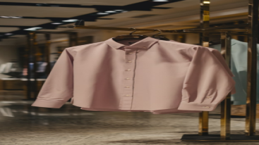 A pastel lavender formal shirt on display in a well-lit modern store.