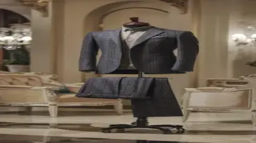 Checkered formal gray suit with a white shirt, displayed in a classic setting